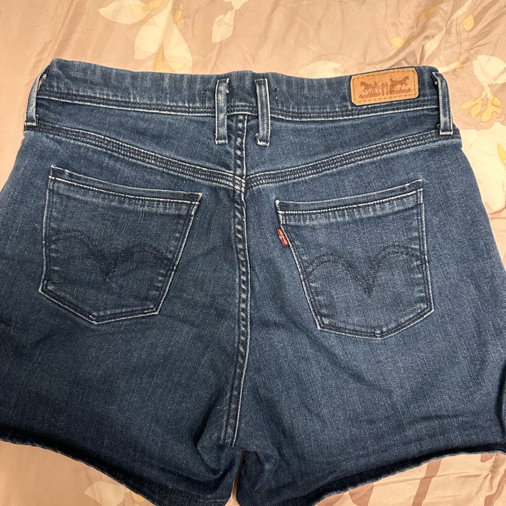 Levi's Blue Jean Shorts with Raw Hem and Distressed Look